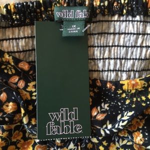 Brand: Wild Fable. Black and yellow crop top